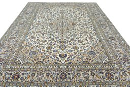 Surface texture of 2000s Kashan rug with natural Wool and intricate pattern