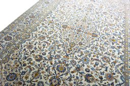 Backside of handmade 2000s Kashan rug showing knot structure and weave density