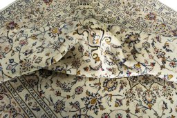 Surface texture of 2000s Kashan rug with natural Wool and intricate pattern