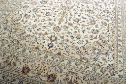 Close-up detail of 2000s Kashan rug from Iran / Persia showing Wool weave
