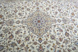Central medallion detail of 2000s Kashan rug from Iran / Persia