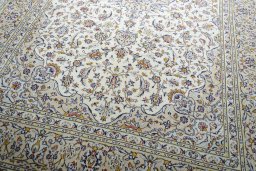Close-up detail of 2000s Kashan rug from Iran / Persia showing Wool weave