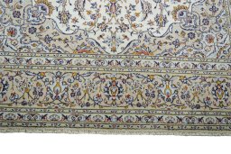 Full view of 2000s Kashan rug from Iran / Persia, 348 × 240 cm in Beige tones