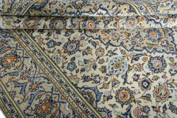Close-up detail of 2000s Kashan rug from Iran / Persia showing Wool weave