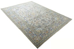 Close-up detail of 2000s Kashan rug from Iran / Persia showing Wool weave