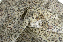 Surface texture of 2000s Kashan rug with natural Wool and intricate pattern