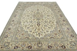 Surface texture of 2000s Kashan rug with natural Wool and intricate pattern