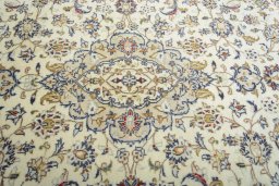 Central medallion detail of 2000s Kashan rug from Iran / Persia