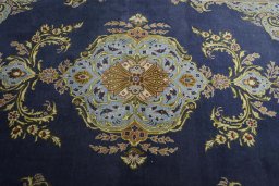 Central medallion detail of 2000s Kashan rug from Iran / Persia