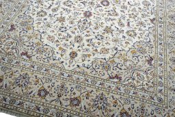 Close-up detail of 2000s Kashan rug from Iran / Persia showing Wool weave