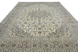 Surface texture of 2000s Kashan rug with natural Wool and intricate pattern