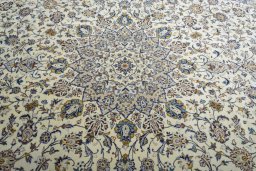 Central medallion detail of 2000s Kashan rug from Iran / Persia