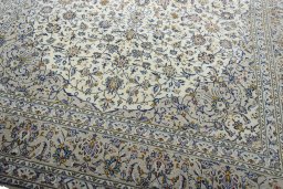 Close-up detail of 2000s Kashan rug from Iran / Persia showing Wool weave