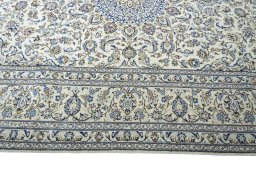Corner detail of New Kashan rug showing border pattern and Wool pile