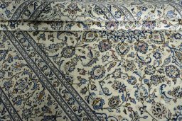 Close-up detail of New Kashan rug from Iran / Persia showing Wool weave