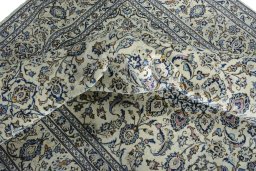 Surface texture of New Kashan rug with natural Wool and intricate pattern