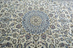 Central medallion detail of New Kashan rug from Iran / Persia