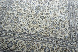 Close-up detail of New Kashan rug from Iran / Persia showing Wool weave