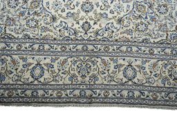 Full view of New Kashan rug from Iran / Persia, 351 × 246 cm in Beige tones