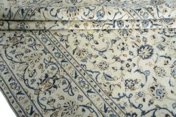 Close-up detail of 2000s Kashan rug from Iran / Persia showing Wool weave