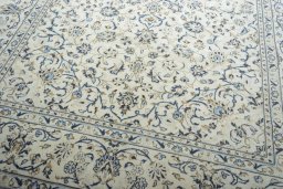 Close-up detail of 2000s Kashan rug from Iran / Persia showing Wool weave