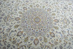 Central medallion detail of 2000s Kashan rug from Iran / Persia