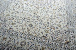 Close-up detail of 2000s Kashan rug from Iran / Persia showing Wool weave
