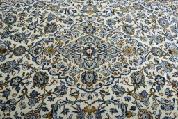 Central medallion detail of 2000s Kashan rug from Iran / Persia