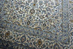 Close-up detail of 2000s Kashan rug from Iran / Persia showing Wool weave