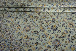 Close-up detail of 2000s Kashan rug from Iran / Persia showing Wool weave