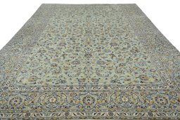 Surface texture of 2000s Kashan rug with natural Wool and intricate pattern