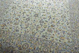 Close-up detail of 2000s Kashan rug from Iran / Persia showing Wool weave