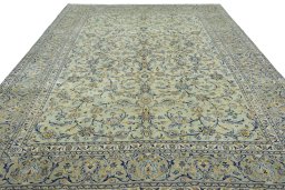 Surface texture of 2000s Kashan rug with natural Wool and intricate pattern