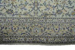 Full view of 2000s Kashan rug from Iran / Persia, 376 × 273 cm in Green tones