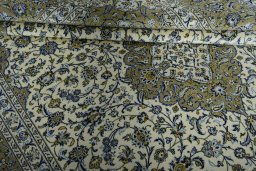 Close-up detail of 2000s Kashan rug from Iran / Persia showing Wool weave
