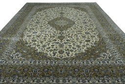 Surface texture of 2000s Kashan rug with natural Wool and intricate pattern