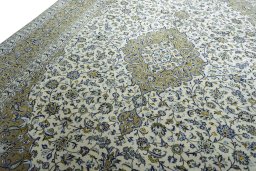 Backside of handmade 2000s Kashan rug showing knot structure and weave density
