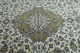Central medallion detail of 2000s Kashan rug from Iran / Persia