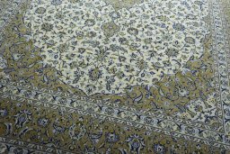Close-up detail of 2000s Kashan rug from Iran / Persia showing Wool weave