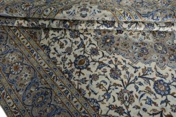 Close-up detail of 2000s Kashan rug from Iran / Persia showing Wool weave
