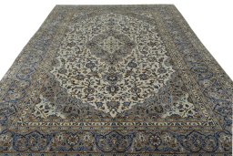 Surface texture of 2000s Kashan rug with natural Wool and intricate pattern