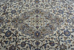 Central medallion detail of 2000s Kashan rug from Iran / Persia