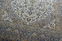 Close-up detail of 2000s Kashan rug from Iran / Persia showing Wool weave