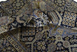 Surface texture of 2000s Kashan rug with natural Wool and intricate pattern