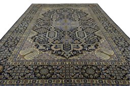 Surface texture of 2000s Kashan rug with natural Wool and intricate pattern
