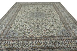 Surface texture of 2000s Kashan rug with natural Wool and intricate pattern