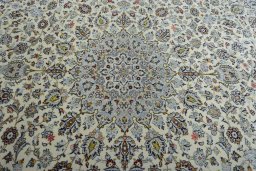 Central medallion detail of 2000s Kashan rug from Iran / Persia