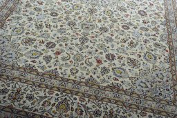 Close-up detail of 2000s Kashan rug from Iran / Persia showing Wool weave