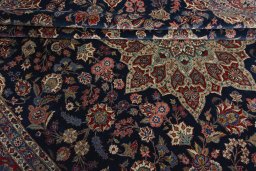 Close-up detail of 1930s Kashan rug from Iran / Persia showing Wool weave