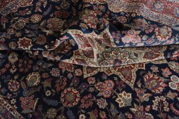 Surface texture of 1930s Kashan rug with natural Wool and intricate pattern